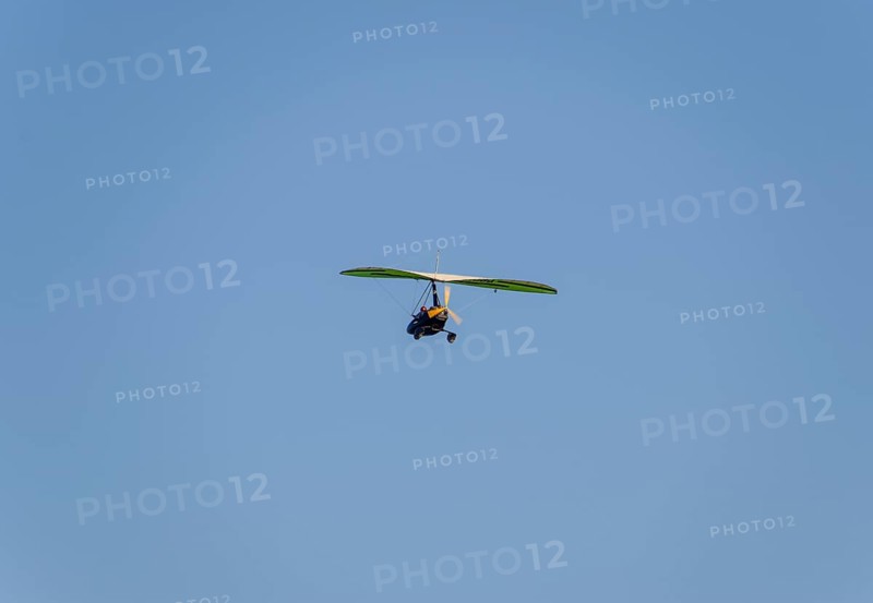 Trike, flying in the sky with two people. Atyrau, Kazakhstan