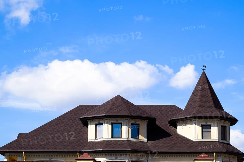Decorative metal tile on a roof. Atyrau, Kazakhstan