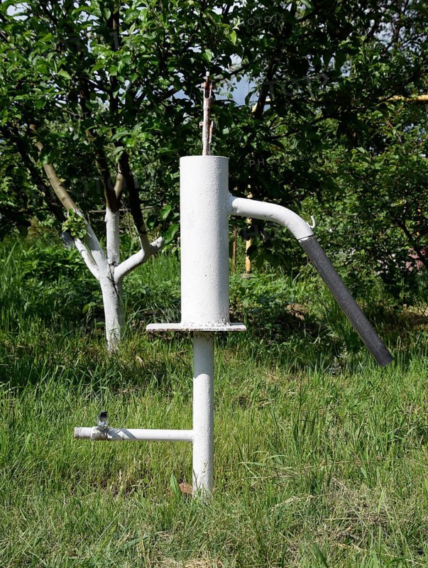 Hand pump leading to an artesian well. Atyrau, Kazakhstan