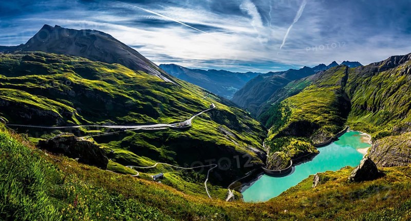 Pasterze Glacier Lake With Hydropower Dam In National Park Hohe Tauern With Großglockner High Alpine Road In Austria