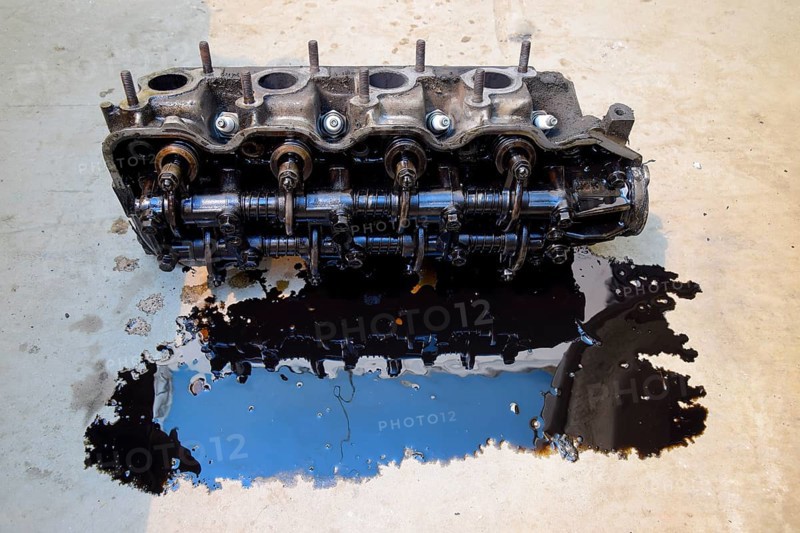 The head of the block of cylinders removed from the engine for repair. Atyrau, Kazakhstan