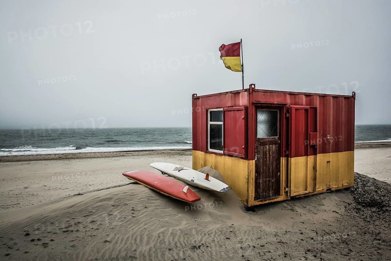 Lifeguard Station And Surfboards At Windy Brittas Bay At The Atlantic Coast in Ireland