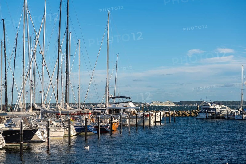 Strande marina near Kiel, Rendsburg-Eckernförde district, AIDA, ship masts, dolphins, Baltic Sea, sailing, leisure activities, water sports, maritime atmosphere, summer, blue sky, sunshine, Bay of Kiel, Schleswig-Holstein, Germany