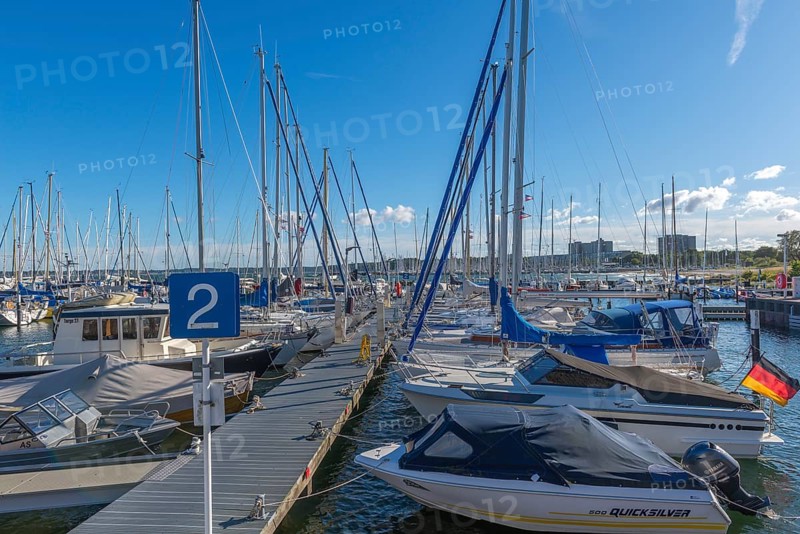 Strande marina near Kiel, Rendsburg-Eckernförde district, ship masts, jetty, Baltic Sea, sailing, leisure activities, water sports, flag, summer, blue sky, sunshine, Bay of Kiel, Schleswig-Holstein, Germany