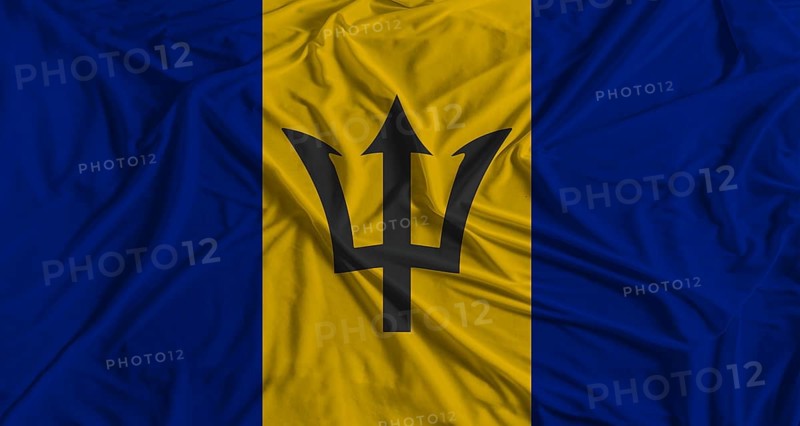 Barbadian flag with fabric texture background. National flag of Barbados
