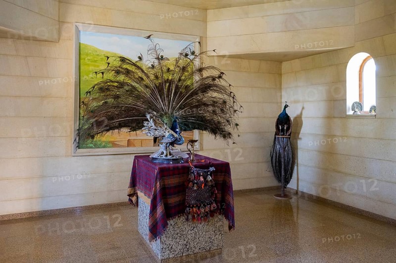 Interior view with peacock sculpture and colourful cloth on table, Yazidi temple, Yazidi temple, Ziyarat temple, Aknalich, Aknalich, Armavir district, Armenia