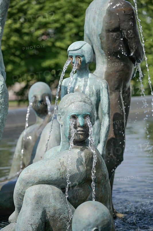 Fountain, art installation by Nina Beier, woman and children, Mannerheimintie, Helsinki, Finland