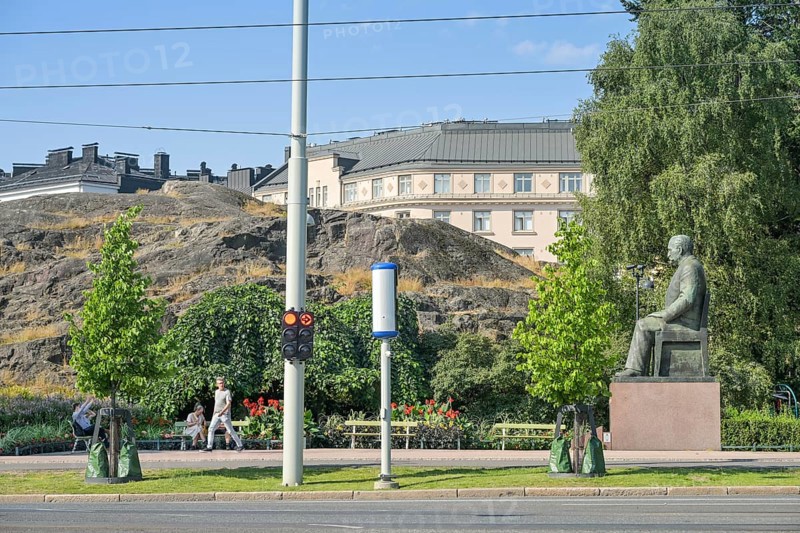 Street scene, passers-by, Kyösti Kallio statue, Mannerheimintie, Helsinki, Finland
