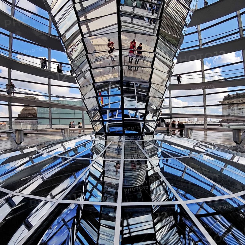 Interior view of the Reichstag dome with the mirror cone and visitors, Reichstag building, government district, Berlin, Germany