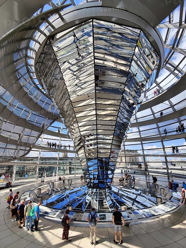 Interior view of the Reichstag dome with the mirror cone and visitors, Reichstag building, government district, Berlin, Germany