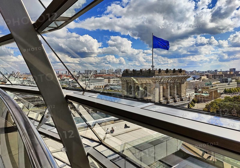 Interior view of the Reichstag dome with a view of a European flag without people, Reichstag building, government district, Berlin, Germany