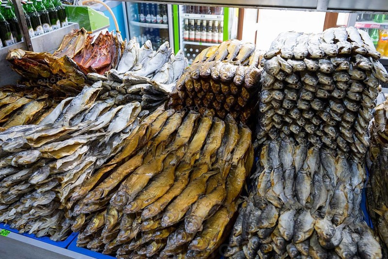 Stacks of fish in different patterns and heights on a market display shelf, fish sale, Tsovagyugh, Lake Sevan, Gegharkunik Province, Armenia
