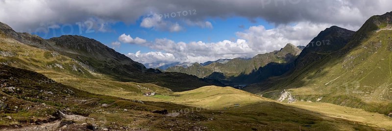 Panorama with Gotthard area, Alpe Carorescio with Piano Grande plateau, Quinto, Ticino, Switzerland