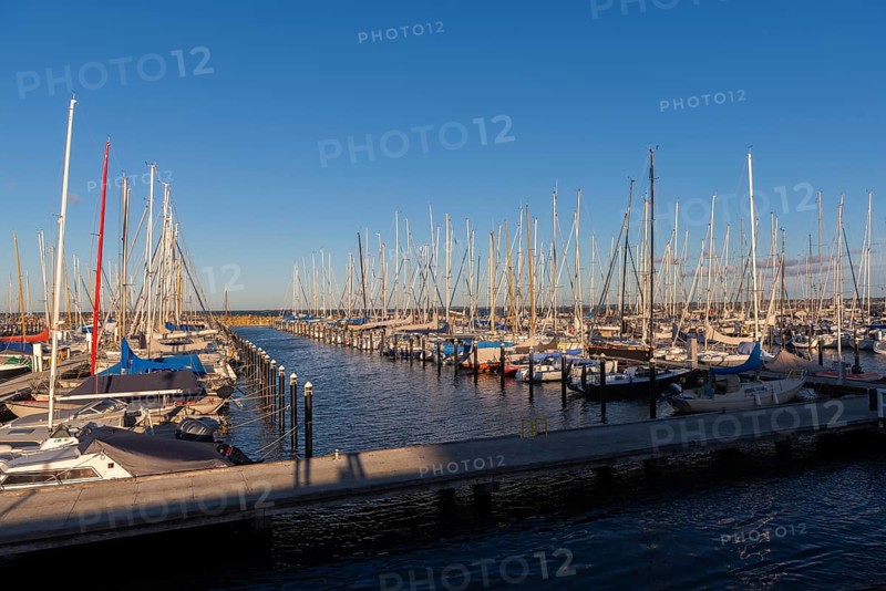 Olympic harbour Schilksee, Olympic Games 1972, sailing yachts at the jetty, ship masts in a row, evening light, sunshine, blue sky, Baltic Sea, Kiel Bay, Kiel Sailing City, Schleswig-Holstein, Germany
