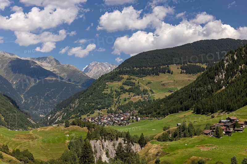 View over Val Medel, behind the village of Curaglia and Surselva, Lukmanier, Grisons, Switzerland