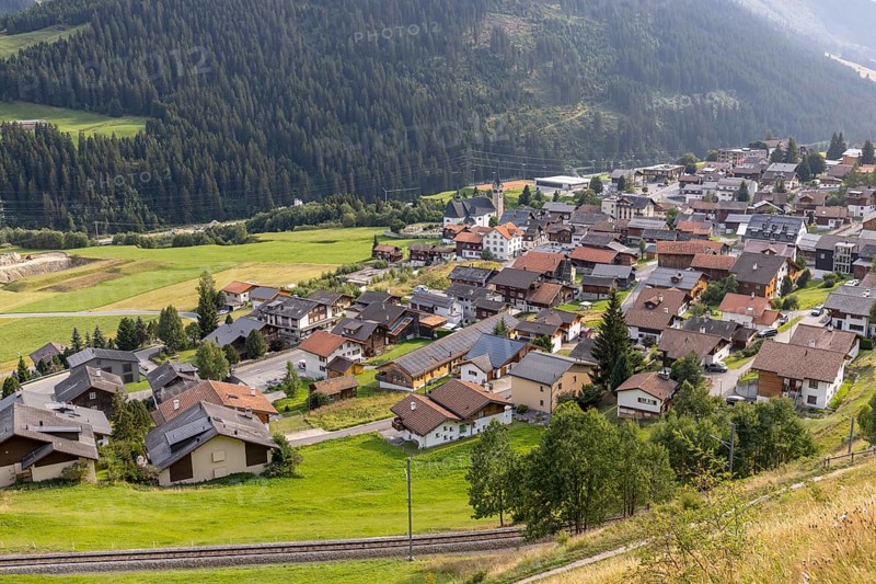 Village of Sedrun with railway line of the Matterhorn-Gotthard Railway MGB, Surselva, Graubünden, Switzerland