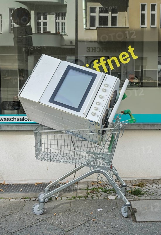 Old electric cooker, rubbish, waste, shopping trolley, Berlin, Germany