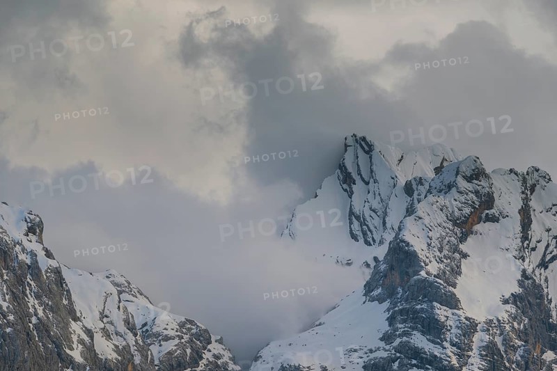 Rising clouds and detailed view of the Sorapis mountain group, Punta Sorapiss, Dolomites, South Tyrol, Italy