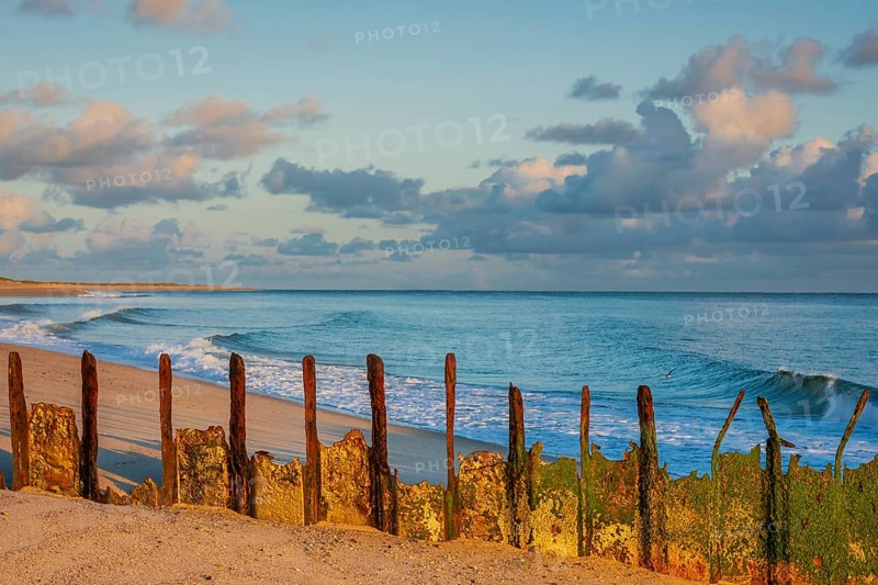 Sunrise on Ellenbogen beach, breakwater, coastal protection, North Sea island of Sylt