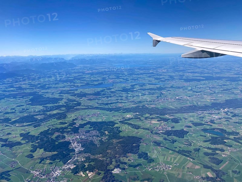 View from the aeroplane of Bürmoos and Lamprechtshausen, Salzburger Land, as well as Lake Waginger See and Lake Chiemsee with the Alps, Bavarian Alpine foothills, Chiemgau, Bavaria, Germany and Austria