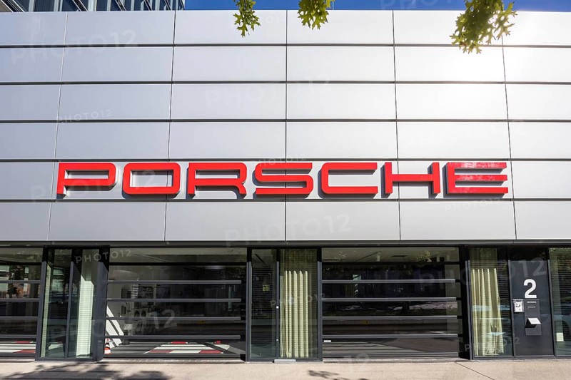 Porsche logo at the Porsche Centre Autohaus am Pragsattel in Stuttgart, Germany