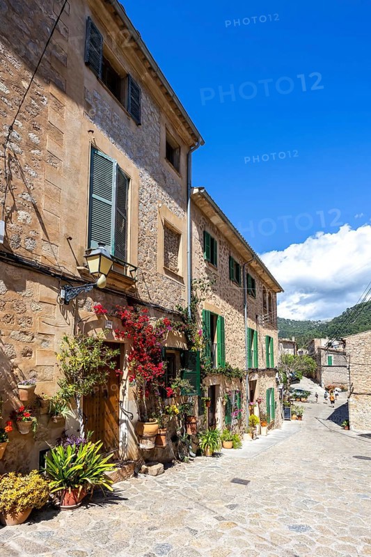 Valldemossa village on Majorca building with flowers trip in Valldemossa, Spain