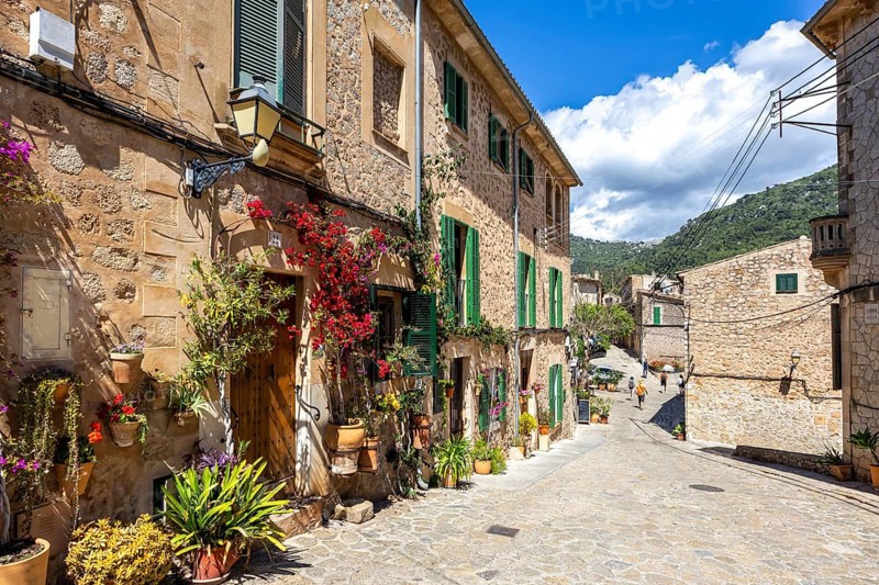 Valldemossa village on Majorca building with flowers trip in Valldemossa, Spain