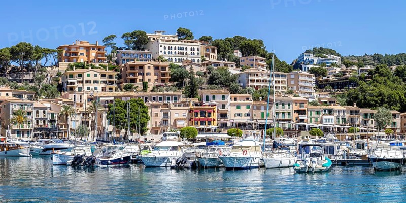 Port de Soller town on Majorca panoramic holiday by the sea yacht harbour with boats trip in Port de Sóller, Spain