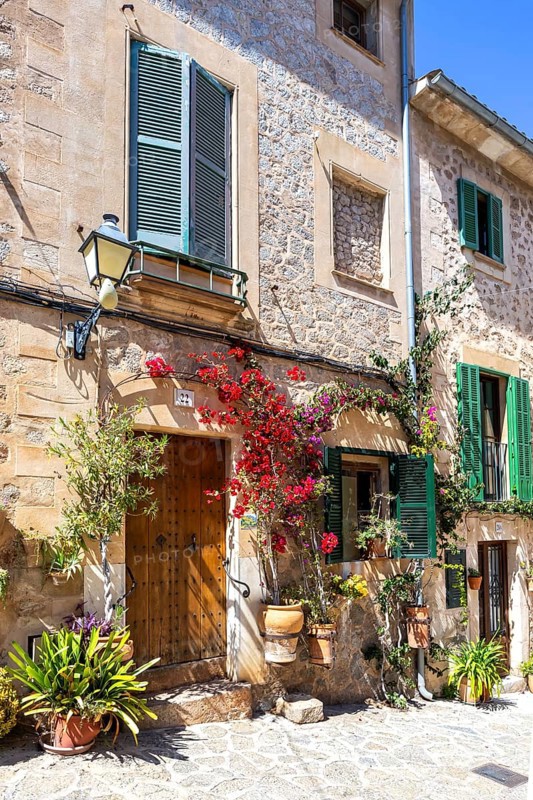 Valldemossa village on Majorca building with flowers trip in Valldemossa, Spain