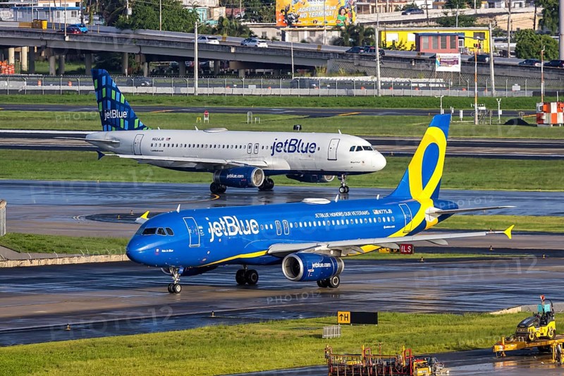 A JetBlue Airways Airbus A320 aircraft with the registration N775JB and the JetBlue Honours our Veterans special livery at San Juan Airport, Puerto Rico