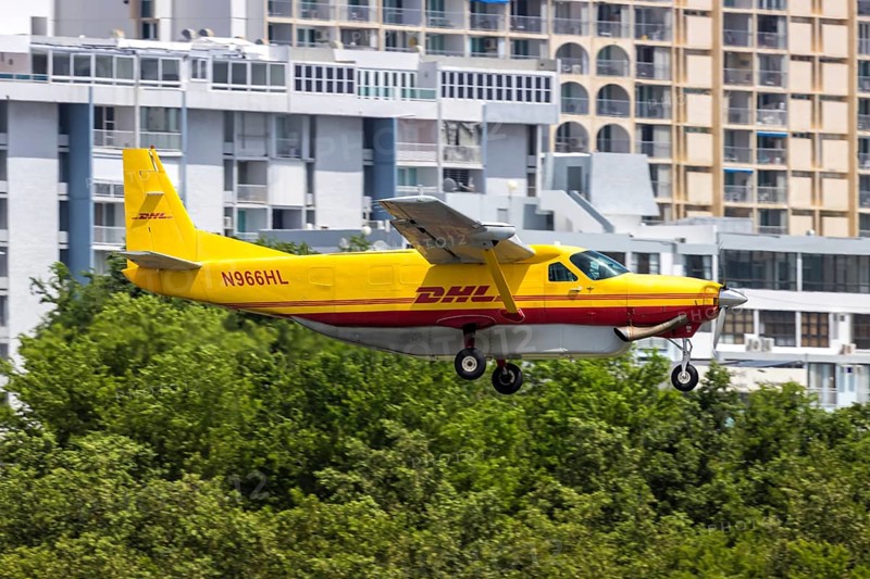 A DHL Cessna 208B Grand Caravan aircraft with licence plate N966HL at San Juan Airport, Puerto Rico