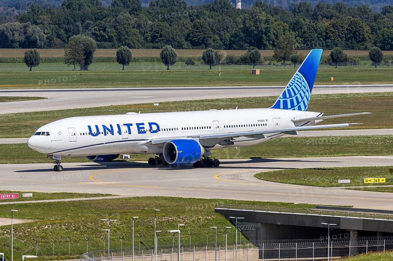 A United Airlines Boeing 777-200ER aircraft with the registration number N78002 at Munich Airport, Germany
