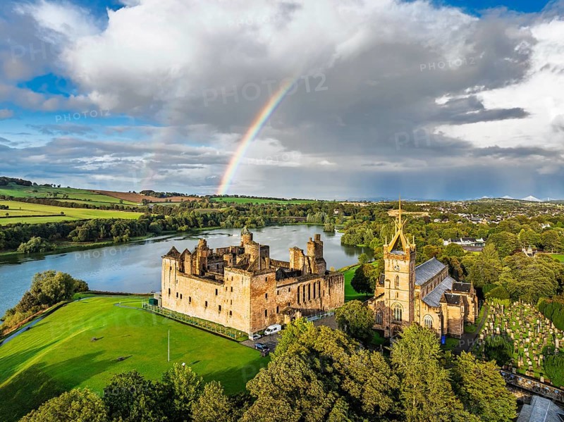 Rainbow over Linlithgow Palace from a drone, Linlithgow Loch, West Lothian, Scotland, United Kingdom