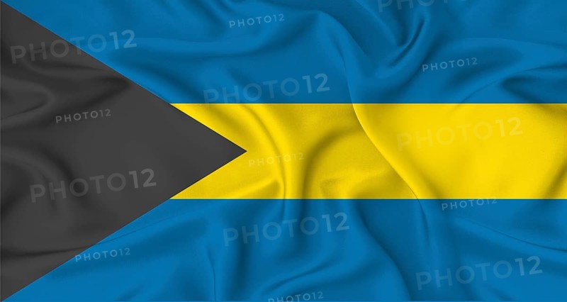 Realistic Bahamas flag waving. Close up of flag of Bahamas with cloth texture