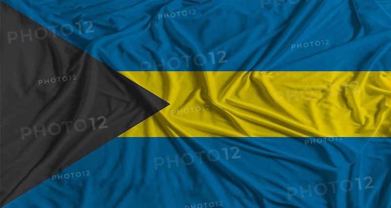 Bahamian flag with fabric texture background. National flag of Bahamas