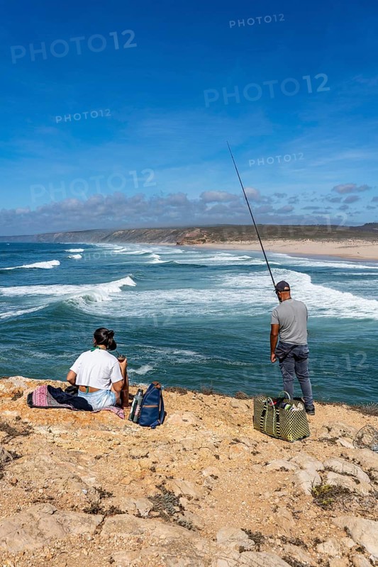 Anglers on the cliffs at the viewpoint above Praia da Bordeira beach, near Carrapateira, popular with surfers, surfers, rocky coast, cliffs in the south-west of the Algarve, Portugal