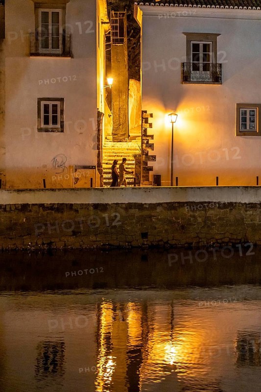 Evening in the old town centre, by the Gilao River, Tavira, in the Algarve, Portugal