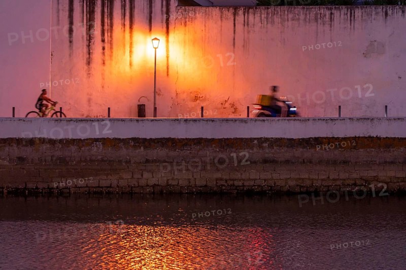 Evening in the old town centre, by the Gilao River, Tavira, in the Algarve, Portugal