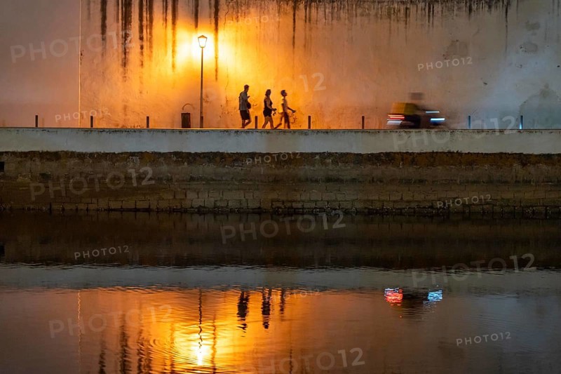 Evening in the old town centre, by the Gilao River, Tavira, in the Algarve, Portugal