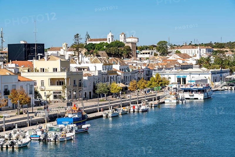 The old town centre of Tavira, on the Gilao River, boats, fishing boats, waterfront promenade, in the Algarve, Portugal