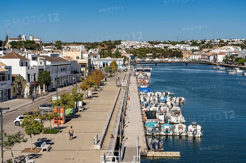 The old town centre of Tavira, on the Gilao River, boats, fishing boats, waterfront promenade, in the Algarve, Portugal