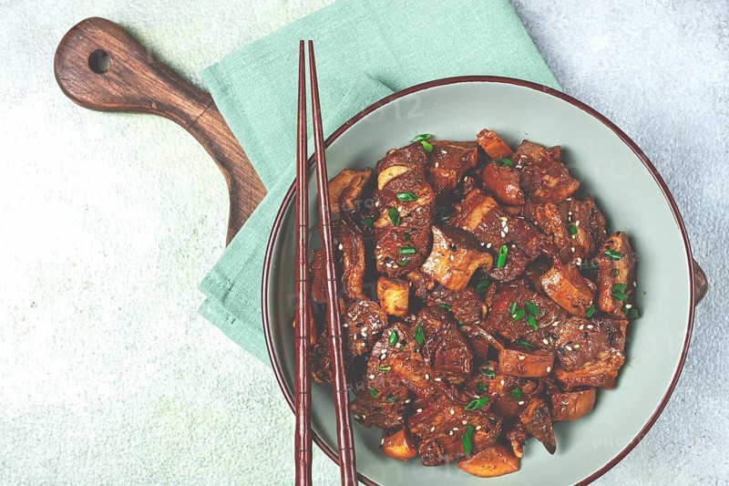 Bulgogi, with mushrooms, with sesame seeds and green onions, Korean cuisine, homemade, no people