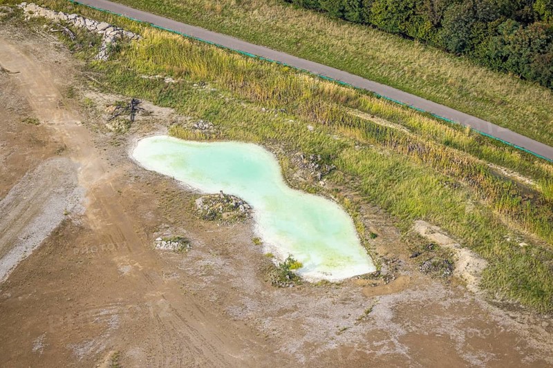 Aerial view, greenish shimmering pond at the landfill Wehofen, Averbruch, Dinslaken, Ruhr area, North Rhine-Westphalia, Germany, DE, Europe, Hanseatic city, aerial view, aerial photography, aerial photography, Lower Rhine, overview, bird's eye view, water, birds-eyes view, overview