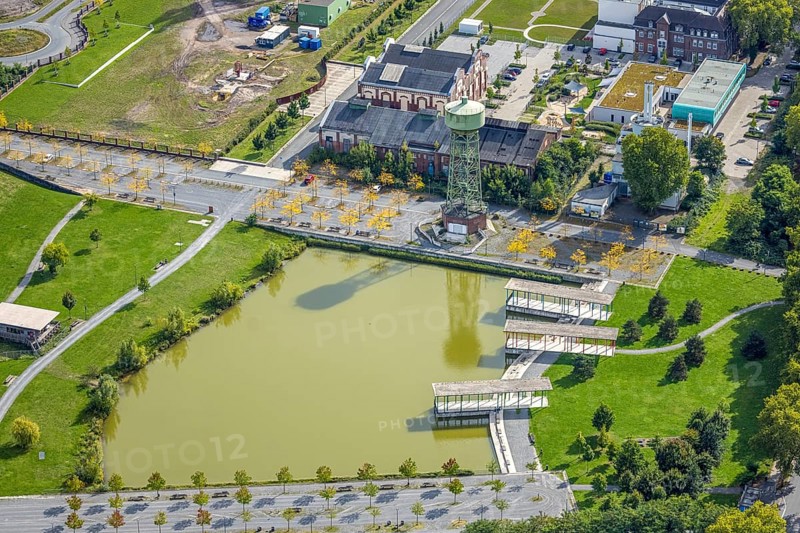 Aerial view, Bergpark Lohberg Kreativquartier, former colliery site and landscaping, Lohberger Weiher with water tower and shadows, Oberlohberg, Dinslaken, Ruhr area, North Rhine-Westphalia, Germany, DE, Europe, Hanseatic city, creative quarter, aerial view, aerial photography, aerial photography, Lower Rhine, tower, overview, bird's eye view, colliery, birds-eyes view, former colliery, overview