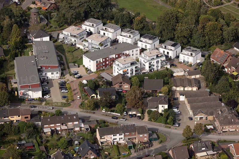 Aerial view, new multi-generational housing estate Högemannshof, single-family houses and apartment blocks, Malteserstift St. Barbara, Hünxe, Ruhr area, North Rhine-Westphalia, Germany, DE, single-family houses, development, Europe, building, community, green spaces, houses, real estate, infrastructure, landscape, aerial view, aerial photography, aerial photography, multi-family houses, multi-generation housing estate, neighbourhood, new construction, Lower Rhine, care facility, settlement, urban planning, streets, overview, bird's-eye view, residential area, residential building, birds-eyes view, modern housing, overview, overview
