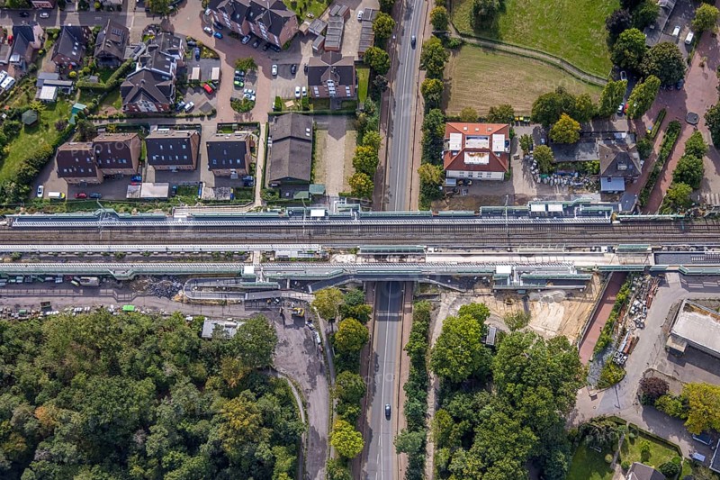 Aerial view, Voerde main station, construction site Steinstraße bridge, construction site pedestrian subway and Bahnhofstraße bridge, extension of the Betuweroute and Betuwe Line railway line, Voerde, Ruhr area, North Rhine-Westphalia, Germany, DE, Europe, aerial view, aerial photography, aerial photography, Lower Rhine, overview, Voerde (Lower Rhine), bird's-eye view, birds-eyes view, overview