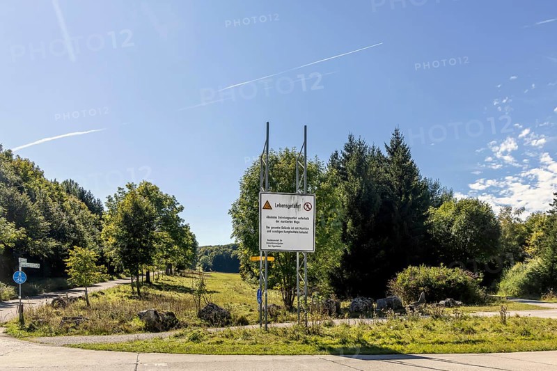 Danger to life from unexploded ordnance in the Swabian Alb biosphere reserve. Landscape of the Alb in autumn. An important component is the former military training area in Münsingen, which is located in the centre of the reserve. The 85, 270-hectare biosphere reserve was established by the state of Baden-Württemberg in 2008. It has been a UNESCO biosphere reserve since 2009. Münsingen, Baden-Württemberg, Germany