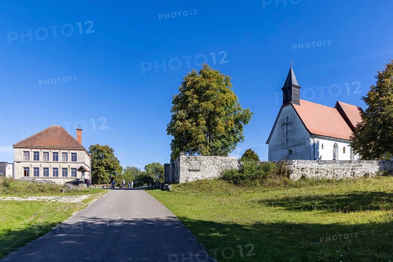 Gruorn is a deserted village near Münsingen in the Swabian Alb. The former village is located in the former military training area and has been part of the newly established Swabian Alb biosphere reserve since 2008. Landscape with St Stephen's Church and the preserved schoolhouse. Münsingen, Baden-Württemberg, Germany