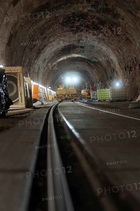 Rail construction in the tunnel with machines and equipment placed on the sides, construction of the Hermann Hesse railway, Calw, Black Forest, Germany