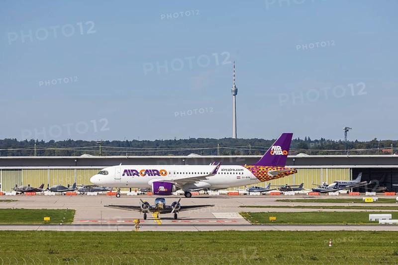 Stuttgart Airport with television tower and aeroplane on the runway. Aircraft registration: SU-BVN, Air Cairo, Airbus A320neo. Stuttgart, Baden-Württemberg, Germany